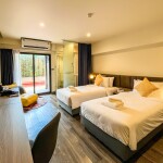 SureStay By Best Western Iconic Ari-Jatujak (ชัวร์สเตย์ บาย เบสท์ เวสเทิร์น ไอคอนิก อารีย์-จตุจักร) ห้อง Deluxe Room Poolside 2 ท่าน, กรุงเทพ